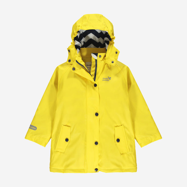 flat - A yellow Muddy Puddles rain jacket with a hood is zipped and buttoned up on a white background.
